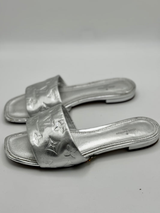 Louis Vuitton Silver Monogram Embossed Leather Revival Flat Slides 37.5