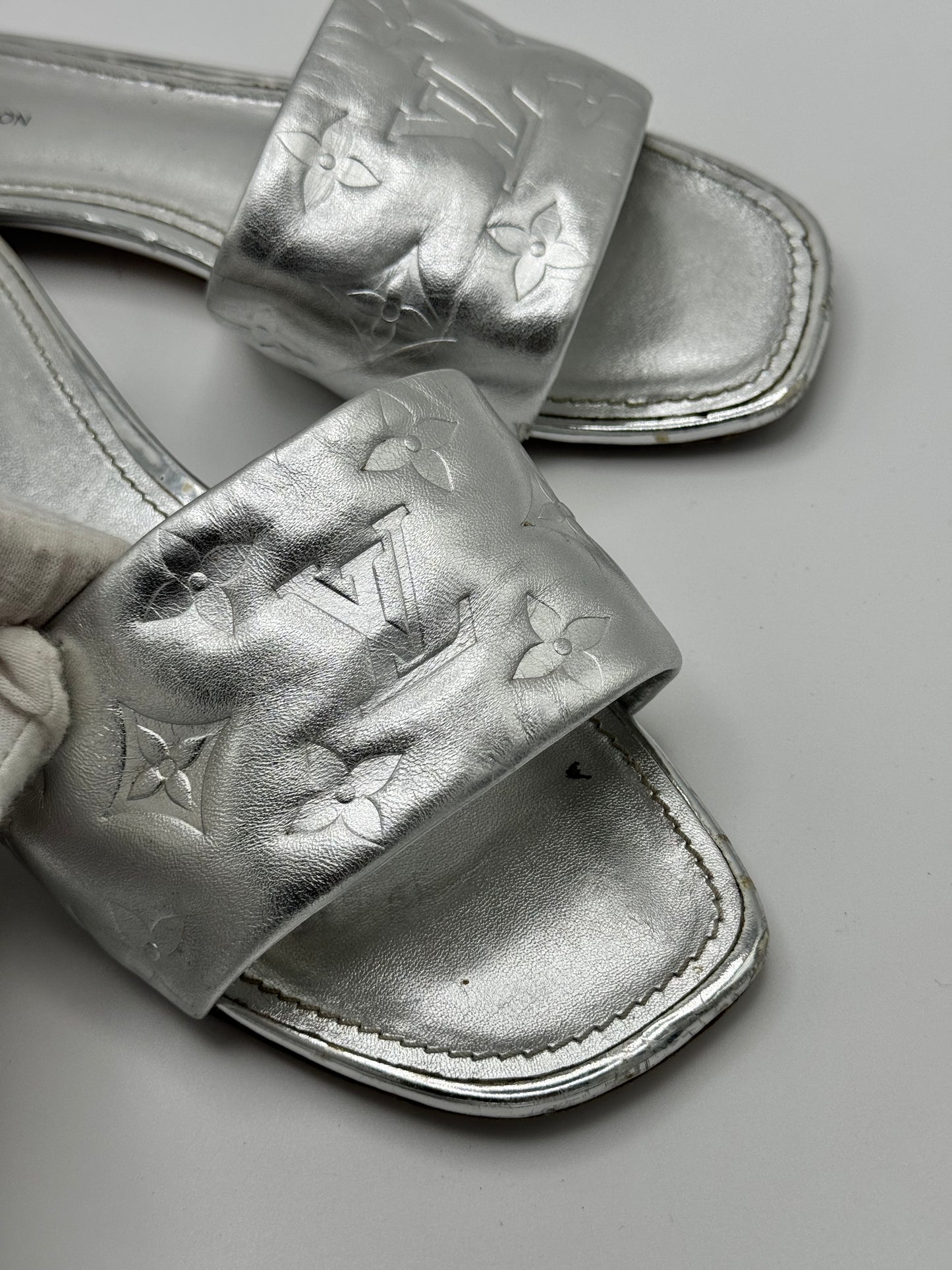 Louis Vuitton Silver Monogram Embossed Leather Revival Flat Slides 37.5