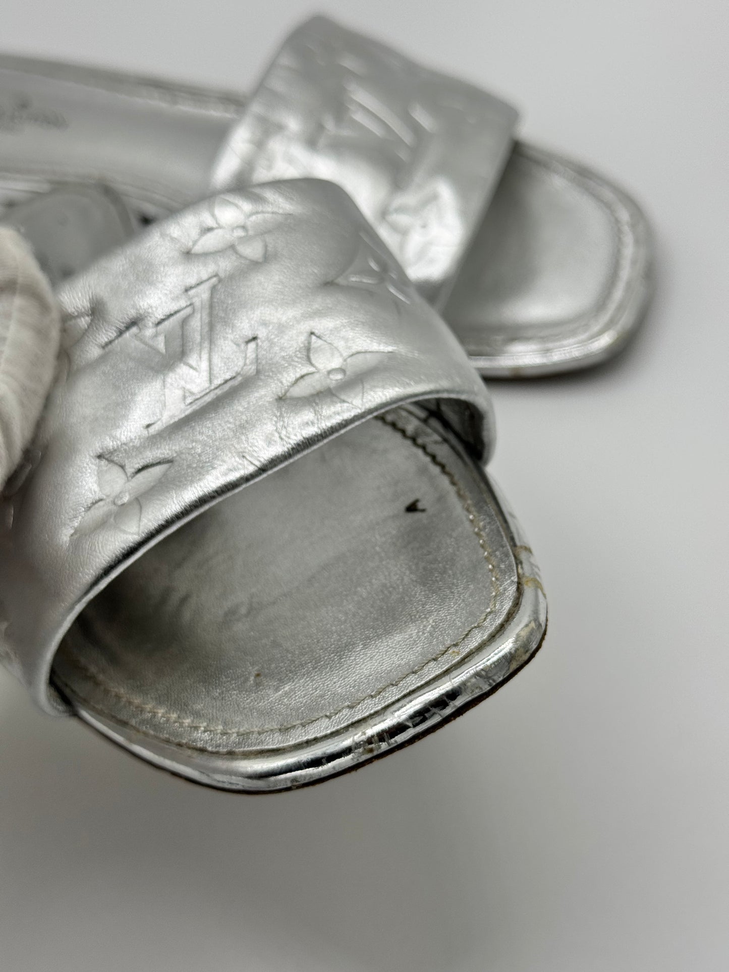 Louis Vuitton Silver Monogram Embossed Leather Revival Flat Slides 37.5