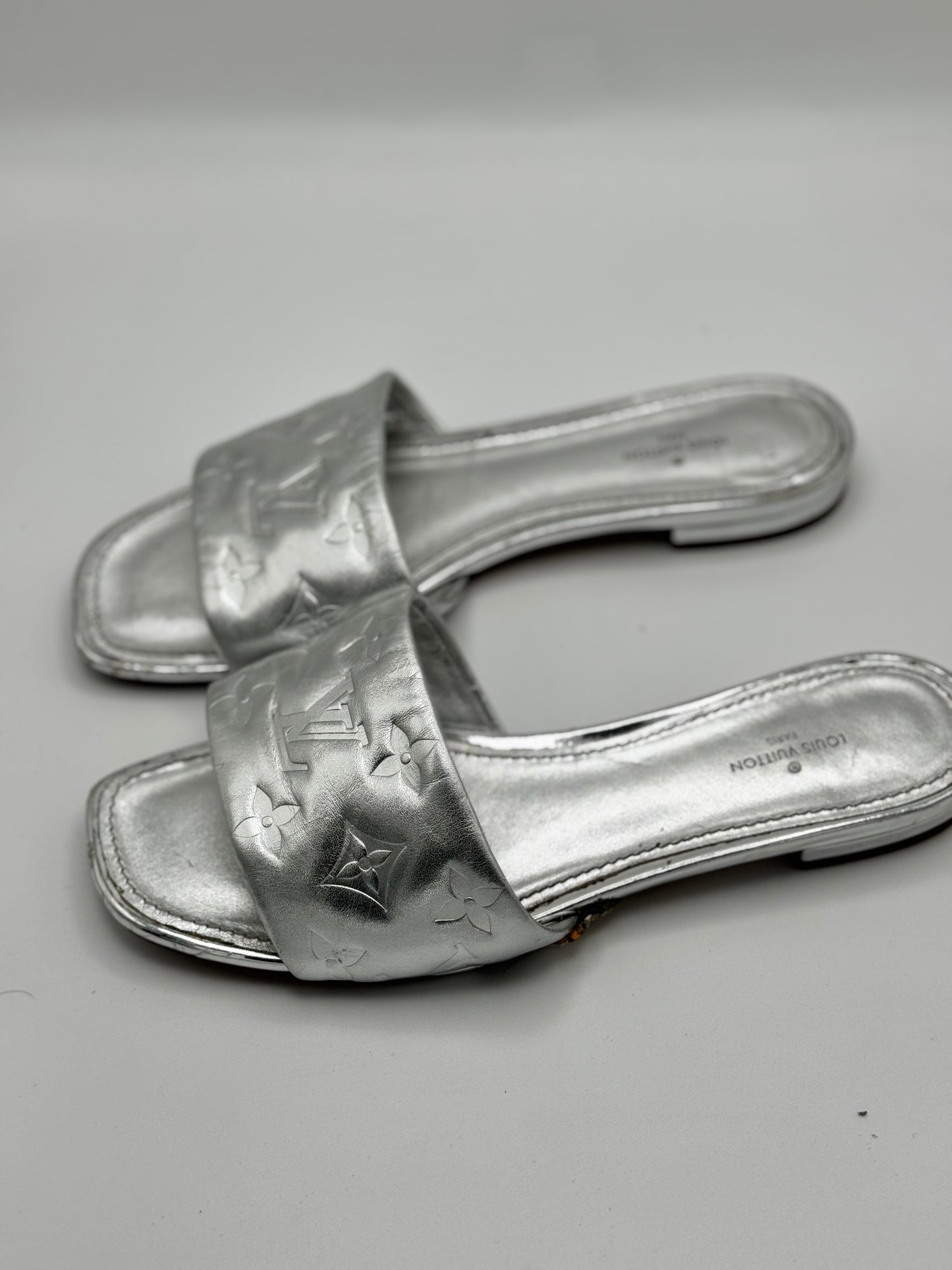 Louis Vuitton Silver Monogram Embossed Leather Revival Flat Slides 37.5