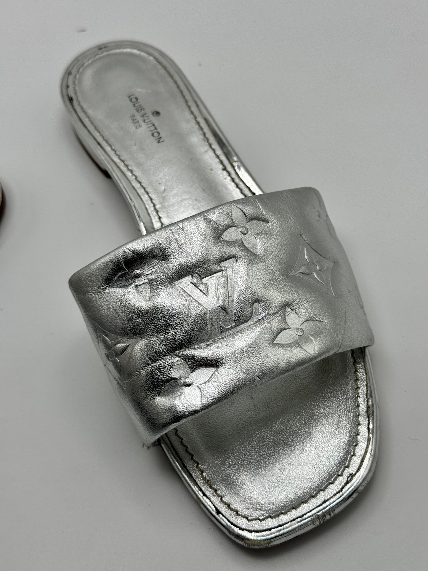 Louis Vuitton Silver Monogram Embossed Leather Revival Flat Slides 37.5