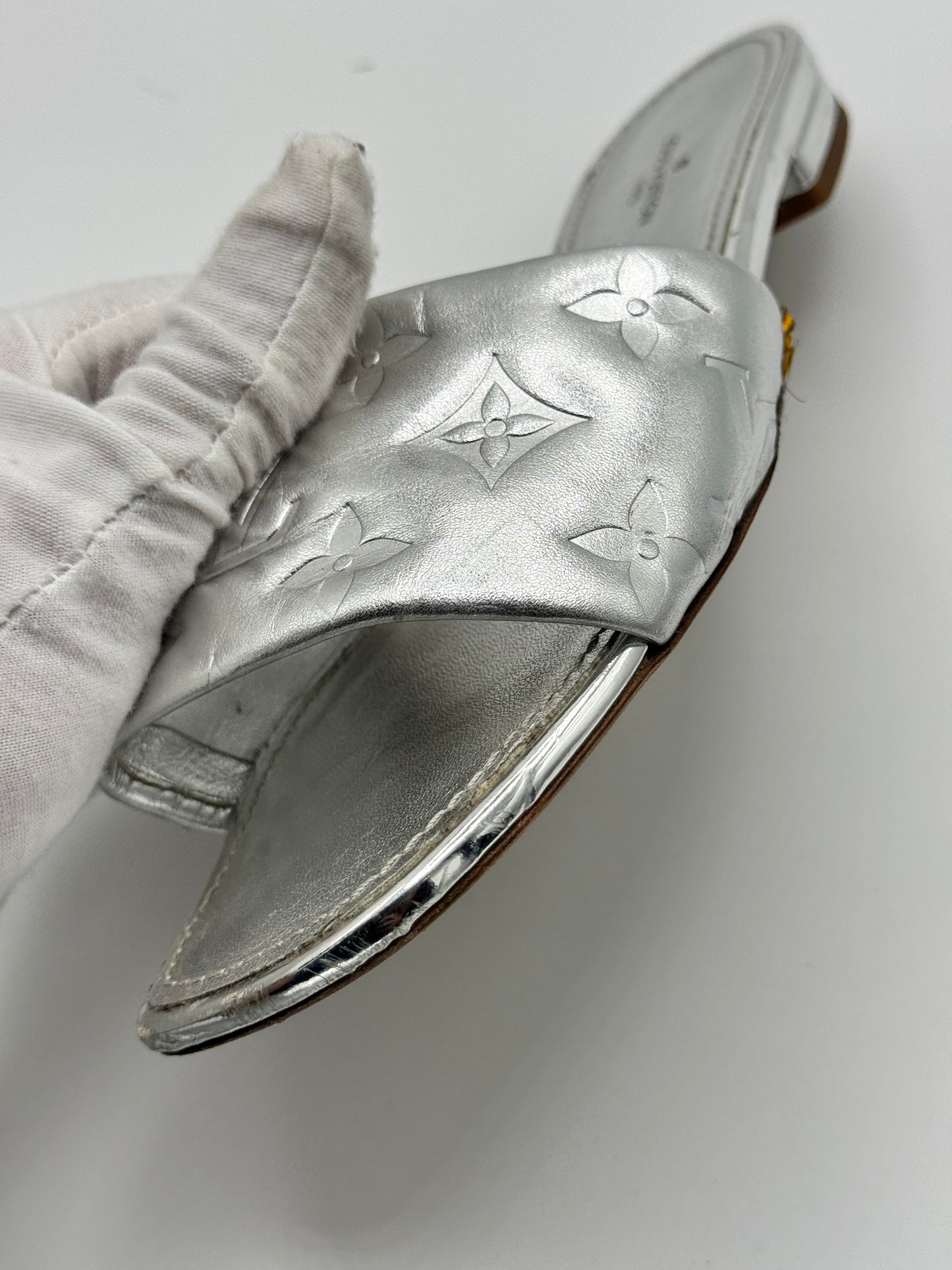 Louis Vuitton Silver Monogram Embossed Leather Revival Flat Slides 37.5