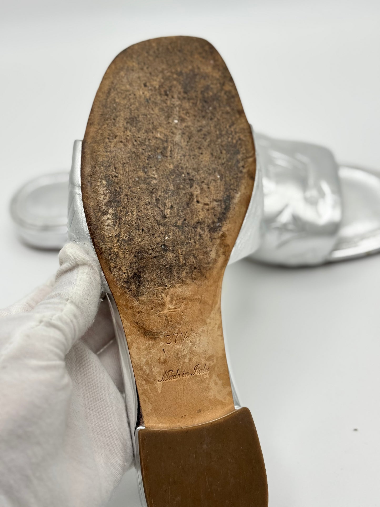 Louis Vuitton Silver Monogram Embossed Leather Revival Flat Slides 37.5