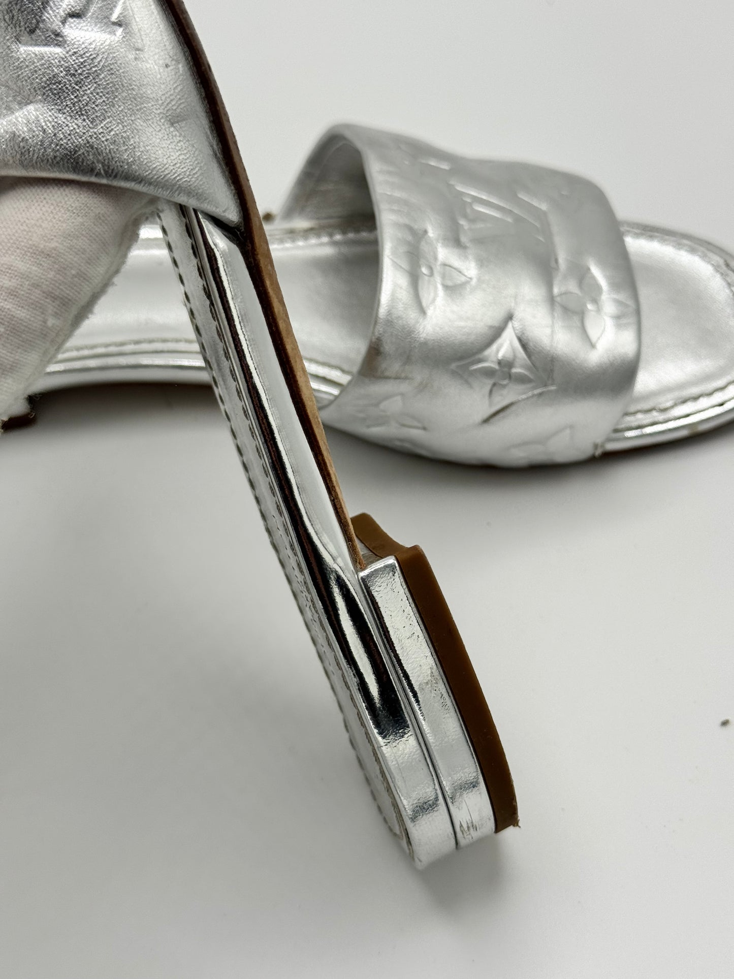 Louis Vuitton Silver Monogram Embossed Leather Revival Flat Slides 37.5