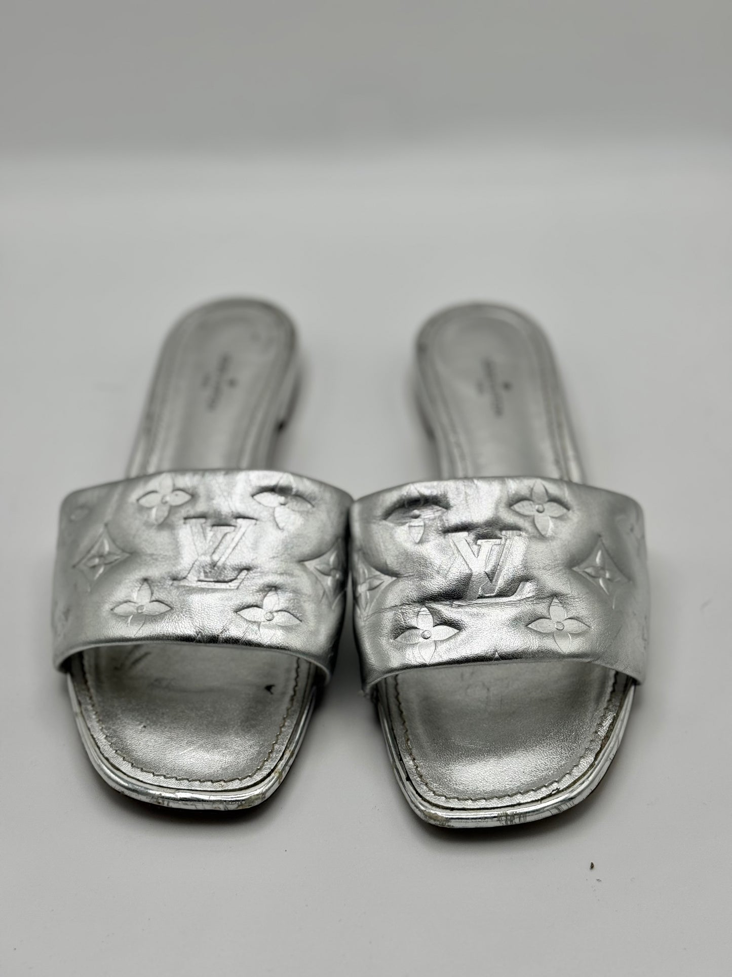 Louis Vuitton Silver Monogram Embossed Leather Revival Flat Slides 37.5