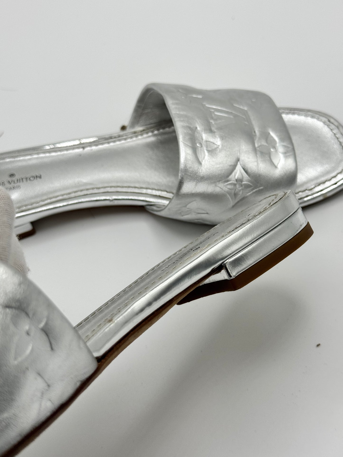 Louis Vuitton Silver Monogram Embossed Leather Revival Flat Slides 37.5